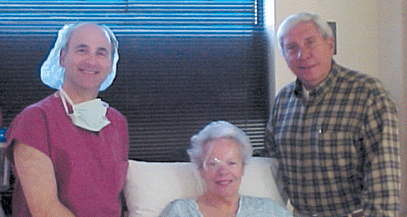 Peter Giannopoulos, MD (right) with his wife (center) immediately after her cataract operation at Wills Eye Plymouth Meeting. James Lewis, MD (left) was her surgeon.